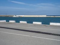 Coastal Road in Barcelona, Europe: Shimmering Ocean Views