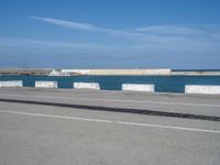 Coastal Road in Barcelona, Europe: Shimmering Ocean Views