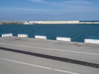 Coastal Road in Barcelona, Europe: Shimmering Ocean Views