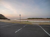 Coastal Road at Dawn: Asphalt with a View of the Ocean