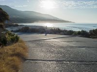 Coastal Road at Dawn: Sunrise on the Beach