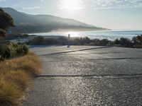 Coastal Road at Dawn: Sunrise on the Beach