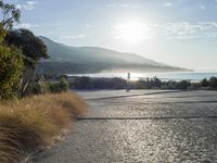 Coastal Road at Dawn: Sunrise on the Beach