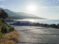 Coastal Road at Dawn: Sunrise on the Beach