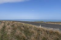 Coastal Road Through Highlands, Plains, and Ocean