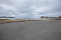 Coastal Road Landscape under a Grey Sky