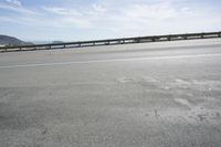 Coastal Road Along the Ocean Shoreline on a Sunny Day