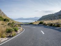 Coastal Road in Spain: Clear Sky and Ocean View