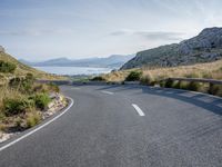 Coastal Road in Spain: Clear Sky and Ocean View