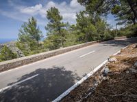 Coastal Road in Spain with Mountains and Ocean View