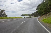 Coastal Road: A Landscape by the Water during the Day