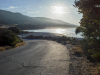 Coastal Sunrise: Clear Sky and Serene Waters