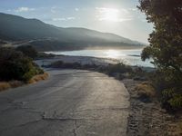 Coastal Sunrise: Clear Sky and Serene Waters
