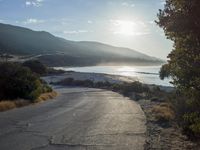 Coastal Sunrise: Clear Sky and Serene Waters