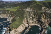 Coastal View: Ocean Cliffs and Contrails