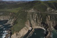 Coastal View: Ocean Cliffs and Contrails