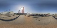 an image of the coaster coaster at an amusement park, looking back down the road