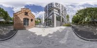 a 360 - view mirror image of a building on the side of the road with a gate