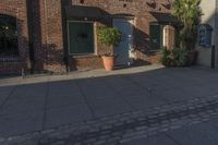 Cobblestone City Street with Brick Buildings