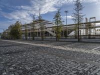 the paved parking lot is empty and ready to be used as a business park area