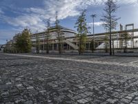 the paved parking lot is empty and ready to be used as a business park area