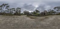 multiple pictures of the same house in the same picture, on top of the hillside