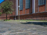 Cobblestone Roads and Shadowed Brick Walls in Berlin