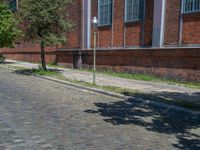 Cobblestone Roads and Shadowed Brick Walls in Berlin