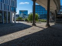 Cobblestone Streets Under Berlin's Clear Sky