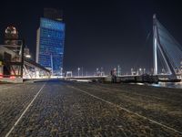 Cobblestone Streets at Night with City Lights