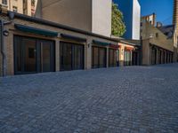 Cobblestone Surface: An Urban Courtyard Architecture