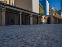 Cobblestone Surface: An Urban Courtyard Architecture