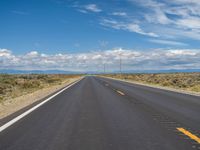 Colorado Asphalt: Clear Sky and Majestic Mountains