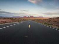 Colorado Dawn on Asphalt Road in the Desert