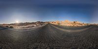 two panoramas of an empty dirt track in the middle of the desert with mountains in the distance