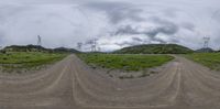 multiple panoramic views of dirt road in grassy field, with power lines on mountains in background