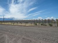 Gravel Road in Colorado Leading to a Solar Power Plant