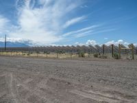 Gravel Road in Colorado Leading to a Solar Power Plant