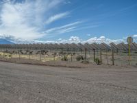 Gravel Road in Colorado Leading to a Solar Power Plant