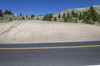 Colorado Highland Road with Mountain and Grass