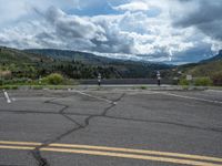 Colorado Landscape: Asphalt Road Leading to a Beautiful Lake