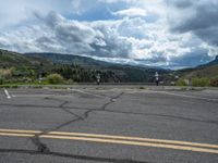 Colorado Landscape: Asphalt Road Leading to a Beautiful Lake