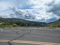 Colorado Landscape: Asphalt Road Leading to a Beautiful Lake