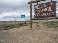 Colorado Landscape: Dirt Road with a Sign