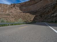 Colorado Landscape: Road Cutting Through Mountains with Long Shadows