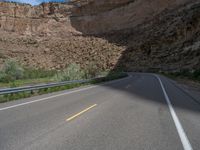 Colorado Landscape: Road Cutting Through Mountains with Long Shadows