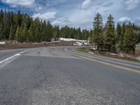 Colorado Landscape: Snowy Road with Clouds