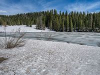 Snowy Road and Lake in Colorado Landscape