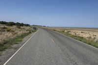 Colorado Landscape with Straight Road and Clear Sky