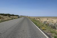 Colorado Landscape with Straight Road and Clear Sky